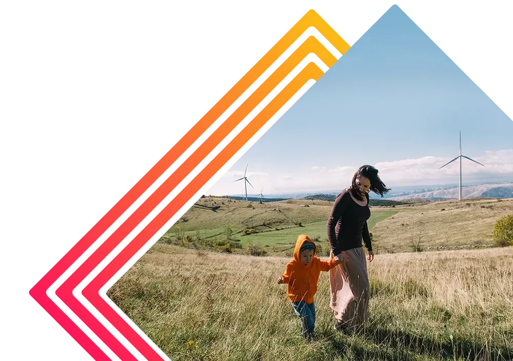 Women and child walking through field